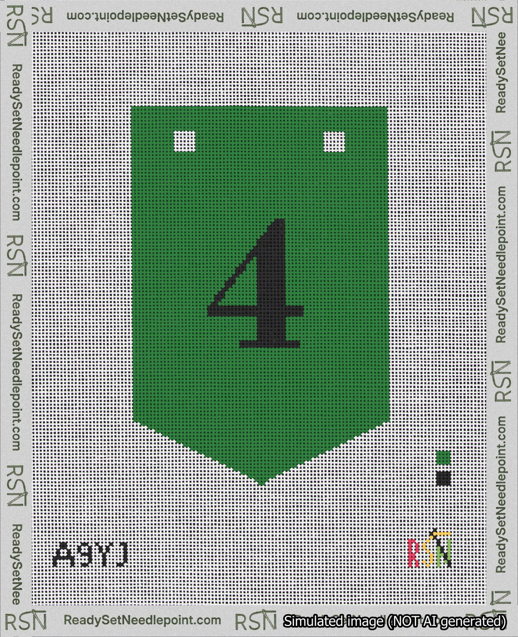 A taped needlepoint canvas with the design: Banner 18 mesh count Pointed 4 Black on Green.