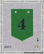 A taped needlepoint canvas with the design: Banner 18 mesh count Pointed 4 Black on Green.