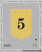 A taped needlepoint canvas with the design: Banner 18 mesh count Pointed 5 Black on Yellow.