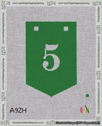 A taped needlepoint canvas with the design: Banner 18 mesh count Pointed 5 White on Green.