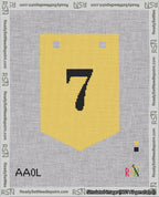 A taped needlepoint canvas with the design: Banner 18 mesh count Pointed 7 Black on Yellow.