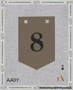 A taped needlepoint canvas with the design: Banner 18 mesh count Pointed 8 Black on Brown.
