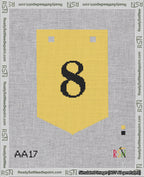 A taped needlepoint canvas with the design: Banner 18 mesh count Pointed 8 Black on Yellow.