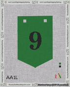 A taped needlepoint canvas with the design: Banner 18 mesh count Pointed 9 Black on Green.
