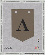 A taped needlepoint canvas with the design: Banner 18 mesh count Pointed A Black on Brown.