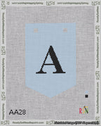 A taped needlepoint canvas with the design: Banner 18 mesh count Pointed A Black on Light Blue.