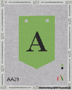 A taped needlepoint canvas with the design: Banner 18 mesh count Pointed A Black on Light Green.