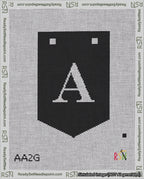 A taped needlepoint canvas with the design: Banner 18 mesh count Pointed A White on Black.