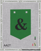 A taped needlepoint canvas with the design: Banner 18 mesh count Pointed Ampersand Black on Green.