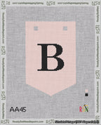 A taped needlepoint canvas with the design: Banner 18 mesh count Pointed B Black on Pink.