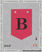 A taped needlepoint canvas with the design: Banner 18 mesh count Pointed B Black on Red.