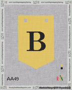 A taped needlepoint canvas with the design: Banner 18 mesh count Pointed B Black on Yellow.