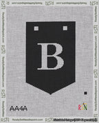 A taped needlepoint canvas with the design: Banner 18 mesh count Pointed B White on Black.