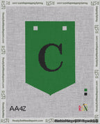 A taped needlepoint canvas with the design: Banner 18 mesh count Pointed C Black on Green.