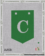 A taped needlepoint canvas with the design: Banner 18 mesh count Pointed C White on Green.