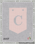 A taped needlepoint canvas with the design: Banner 18 mesh count Pointed C White on Pink.