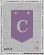 A taped needlepoint canvas with the design: Banner 18 mesh count Pointed C White on Purple.