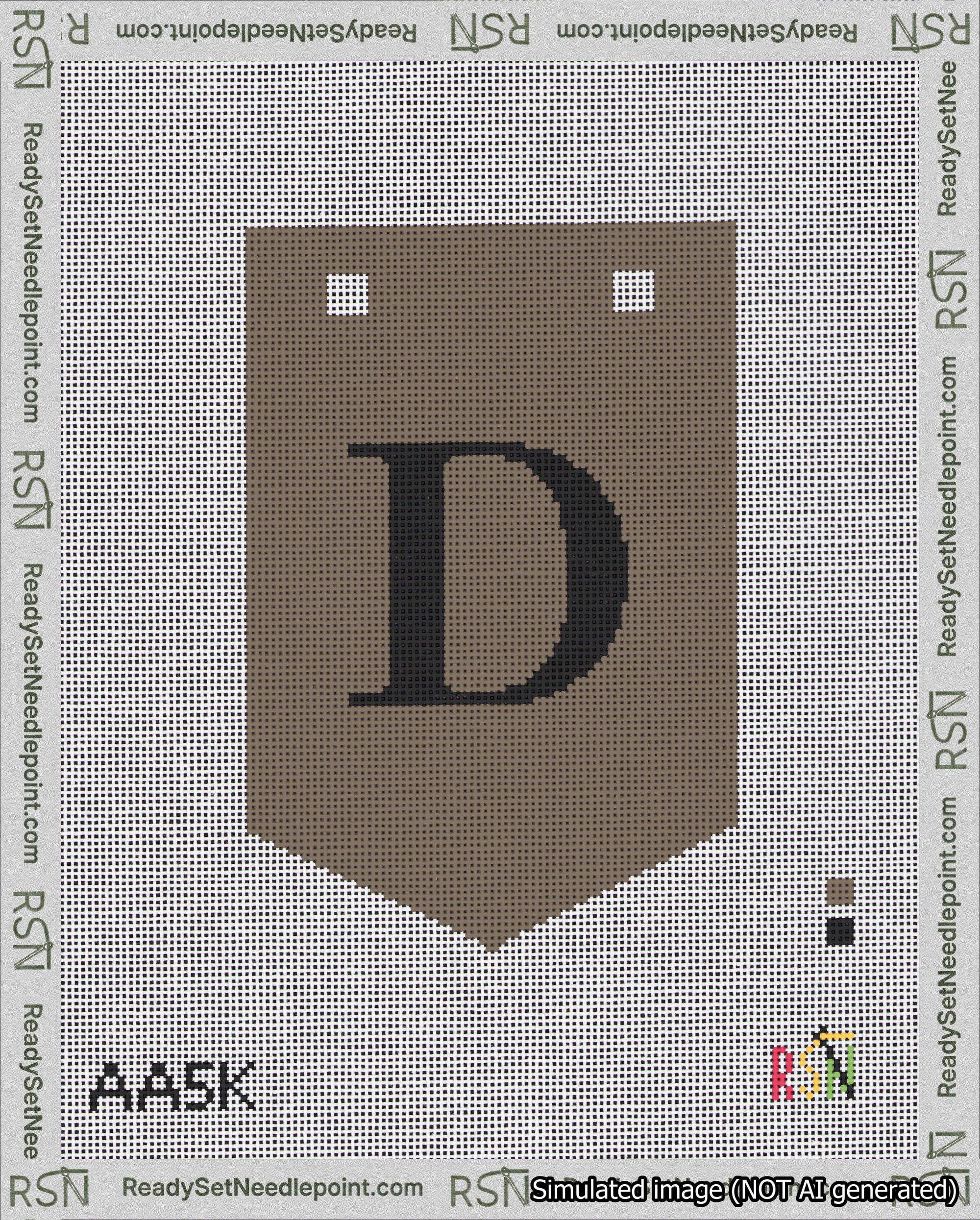 A taped needlepoint canvas with the design: Banner 18 mesh count Pointed D Black on Brown.