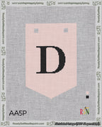 A taped needlepoint canvas with the design: Banner 18 mesh count Pointed D Black on Pink.