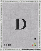 A taped needlepoint canvas with the design: Banner 18 mesh count Pointed D Black on White.