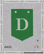 A taped needlepoint canvas with the design: Banner 18 mesh count Pointed D White on Green.
