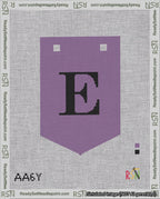 A taped needlepoint canvas with the design: Banner 18 mesh count Pointed E Black on Purple.