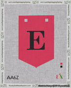A taped needlepoint canvas with the design: Banner 18 mesh count Pointed E Black on Red.