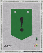 A taped needlepoint canvas with the design: Banner 18 mesh count Pointed Exclamation Black on Green.