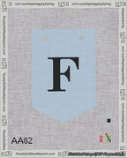 A taped needlepoint canvas with the design: Banner 18 mesh count Pointed F Black on Light Blue.