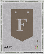 A taped needlepoint canvas with the design: Banner 18 mesh count Pointed F White on Brown.
