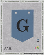 A taped needlepoint canvas with the design: Banner 18 mesh count Pointed G Black on Blue.