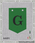 A taped needlepoint canvas with the design: Banner 18 mesh count Pointed G Black on Green.