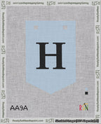 A taped needlepoint canvas with the design: Banner 18 mesh count Pointed H Black on Light Blue.
