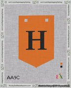 A taped needlepoint canvas with the design: Banner 18 mesh count Pointed H Black on Orange.