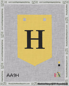 A taped needlepoint canvas with the design: Banner 18 mesh count Pointed H Black on Yellow.