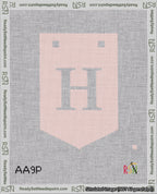 A taped needlepoint canvas with the design: Banner 18 mesh count Pointed H White on Pink.