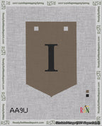 A taped needlepoint canvas with the design: Banner 18 mesh count Pointed I Black on Brown.