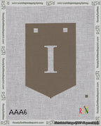 A taped needlepoint canvas with the design: Banner 18 mesh count Pointed I White on Brown.