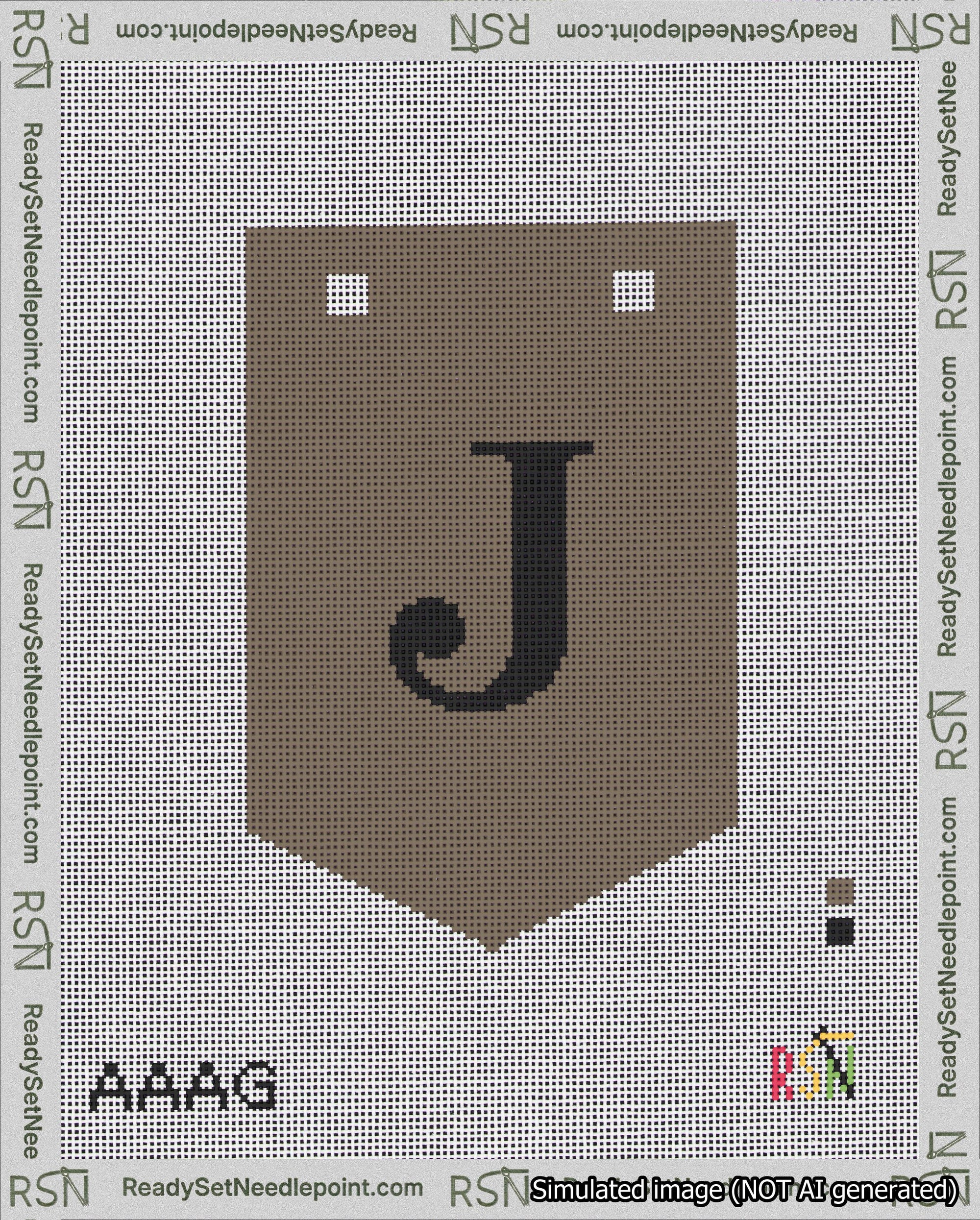 A taped needlepoint canvas with the design: Banner 18 mesh count Pointed J Black on Brown.