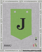 A taped needlepoint canvas with the design: Banner 18 mesh count Pointed J Black on Light Green.