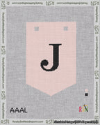 A taped needlepoint canvas with the design: Banner 18 mesh count Pointed J Black on Pink.