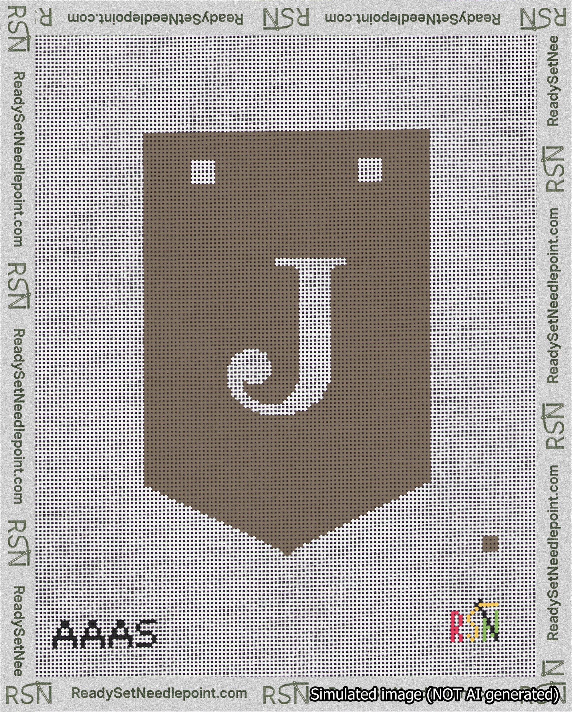 A taped needlepoint canvas with the design: Banner 18 mesh count Pointed J White on Brown.