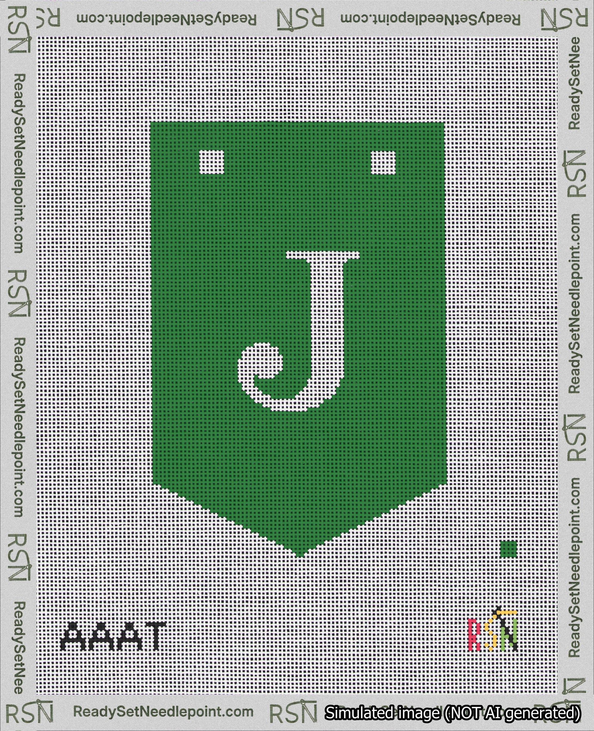 A taped needlepoint canvas with the design: Banner 18 mesh count Pointed J White on Green.