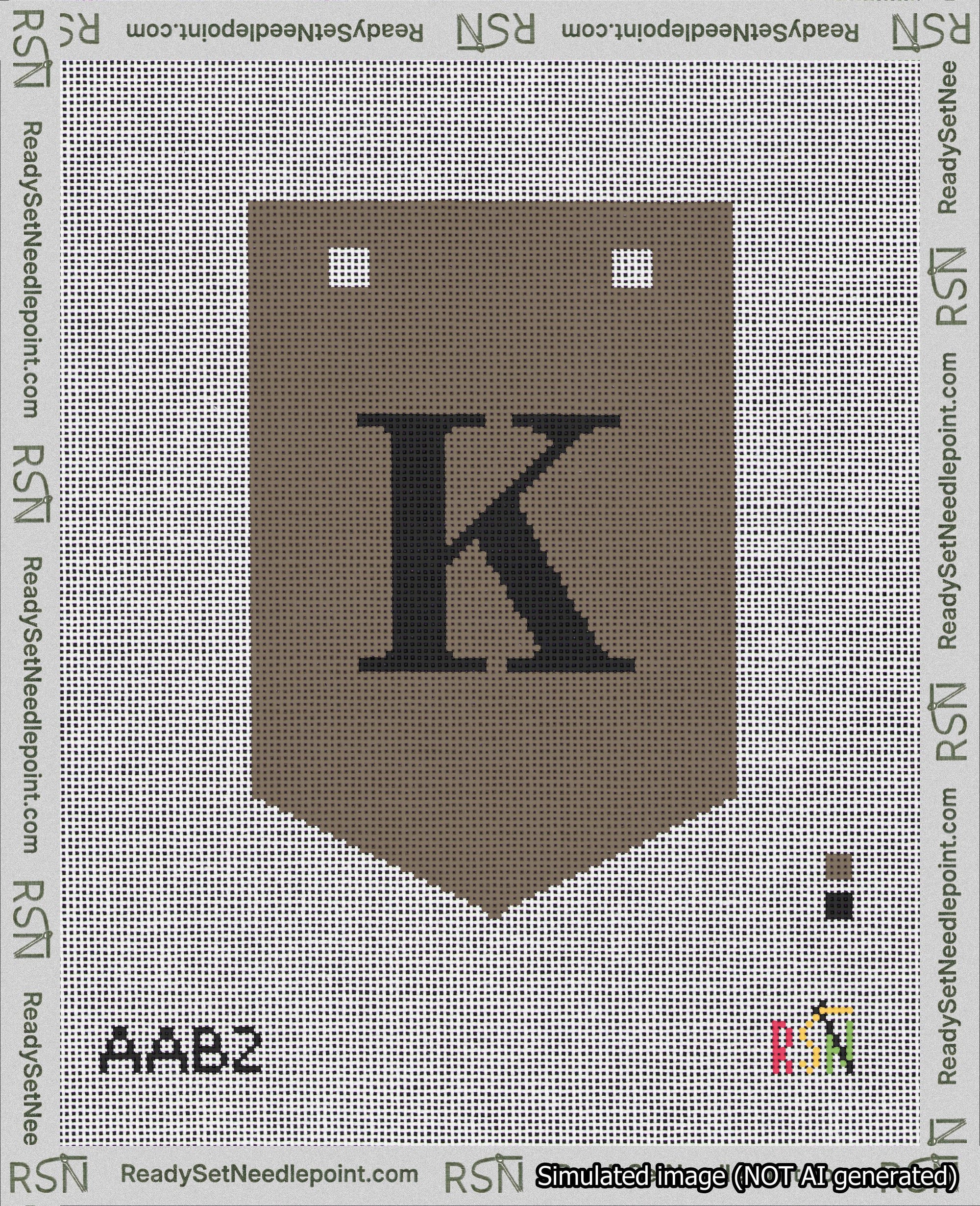 A taped needlepoint canvas with the design: Banner 18 mesh count Pointed K Black on Brown.