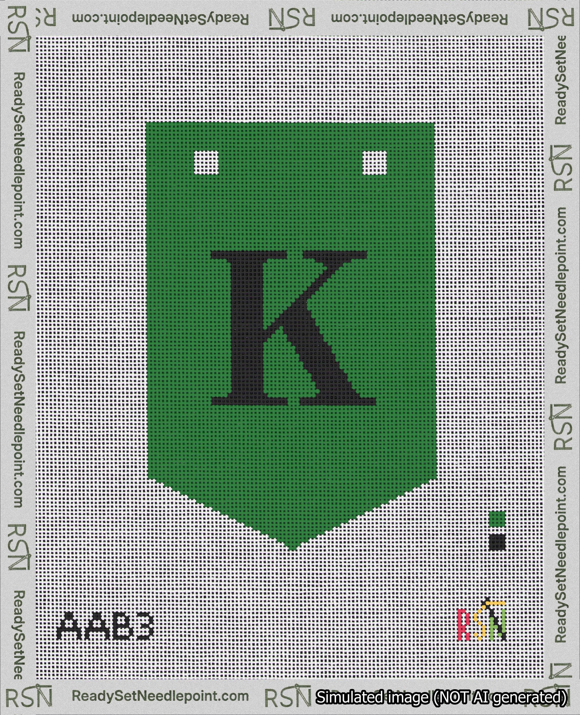 A taped needlepoint canvas with the design: Banner 18 mesh count Pointed K Black on Green.