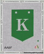 A taped needlepoint canvas with the design: Banner 18 mesh count Pointed K White on Green.