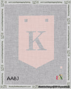 A taped needlepoint canvas with the design: Banner 18 mesh count Pointed K White on Pink.