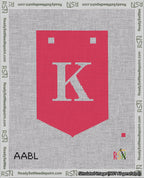 A taped needlepoint canvas with the design: Banner 18 mesh count Pointed K White on Red.