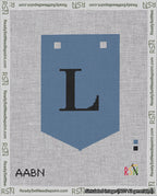 A taped needlepoint canvas with the design: Banner 18 mesh count Pointed L Black on Blue.