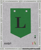 A taped needlepoint canvas with the design: Banner 18 mesh count Pointed L Black on Green.